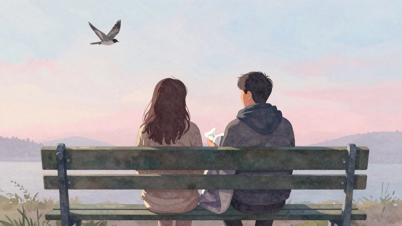 Two figures sit on a park bench at dawn, sharing a blanket in quiet solidarity, no phones, just dawn light.